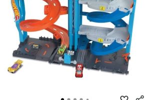 Hot Wheels®️ Heyecanlı Yarış Kulesi | Araç ve parça seti ölçekli 1:64, 2 oyun modu, tek veya çift yarış, HKX43